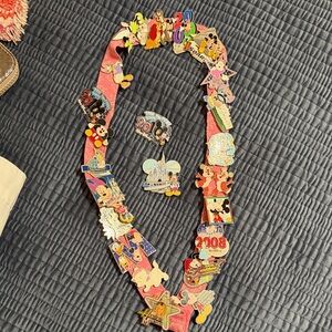 Disney Pin Collection on Pink Lanyard
